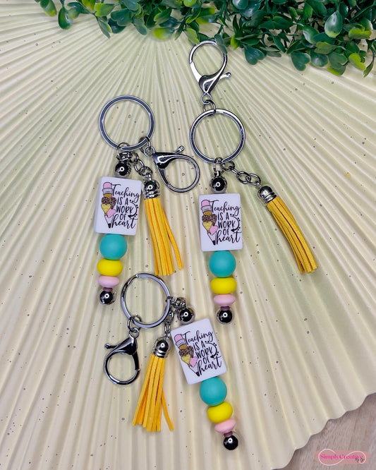 Teaching is a work of heart metal bar keychain